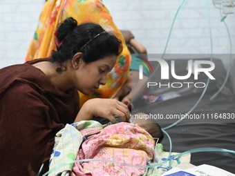 Children are receiving medical treatment for pneumonia at Dhaka Child Hospital amid an ongoing heatwave in Dhaka, Bangladesh, on April 21, 2...