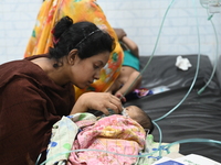 Children are receiving medical treatment for pneumonia at Dhaka Child Hospital amid an ongoing heatwave in Dhaka, Bangladesh, on April 21, 2...