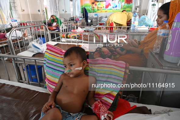 Children are receiving medical treatment for pneumonia at Dhaka Child Hospital amid an ongoing heatwave in Dhaka, Bangladesh, on April 21, 2...