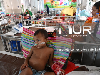 Children are receiving medical treatment for pneumonia at Dhaka Child Hospital amid an ongoing heatwave in Dhaka, Bangladesh, on April 21, 2...