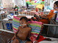 Children are receiving medical treatment for pneumonia at Dhaka Child Hospital amid an ongoing heatwave in Dhaka, Bangladesh, on April 21, 2...