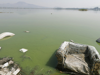 An armchair is sitting in Lake Chalco-Xico, State of Mexico. This Sunday is World Earth Day, which the United Nations declared as World Moth...