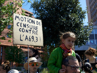 Protesters are holding placards expressing a vote of no confidence against the A69 as several thousand people demonstrate in the streets of...