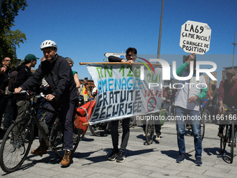 Protesters are holding banners that read 'Yes to the reprofiling of the N126, free and secure' as several thousand people are demonstrating...