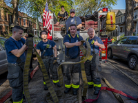 The Chicago Fire Department and Chicago Police Department respond to a structure fire at 1921 West Newport Avenue, in Chicago, IL, in the Ro...