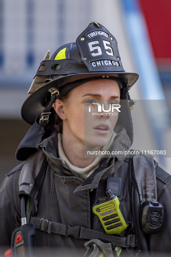 The Chicago Fire Department and Chicago Police Department respond to a structure fire at 1921 West Newport Avenue, in Chicago, IL, in the Ro...