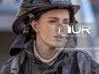 The Chicago Fire Department and Chicago Police Department respond to a structure fire at 1921 West Newport Avenue, in Chicago, IL, in the Ro...