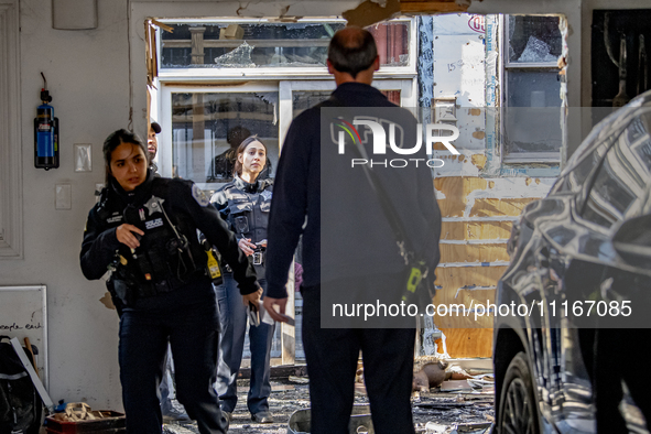 The Chicago Fire Department and Chicago Police Department respond to a structure fire at 1921 West Newport Avenue, in Chicago, IL, in the Ro...