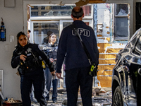 The Chicago Fire Department and Chicago Police Department respond to a structure fire at 1921 West Newport Avenue, in Chicago, IL, in the Ro...