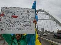 EDMONTON, CANADA - APRIL 21, 2024:
Members of the Ukrainian diaspora proudly wave national flags, hold blue and yellow balloons, and display...