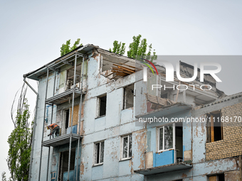 Workers are reconstructing a residential building damaged by a Russian missile strike on the night of March 2, 2023, at 67 Nezalezhnoyi Ukra...