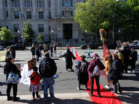 Climate activists with the Extinction Rebellion DC organization stage a protest outside of the John A. Wilson building in Washington, D.C. o...