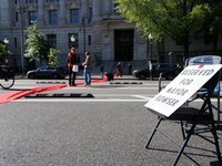 Climate activists with the Extinction Rebellion DC organization stage a protest outside of the John A. Wilson building in Washington, D.C. o...