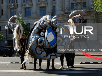 Climate activists with the Extinction Rebellion DC organization stage a protest outside of the John A. Wilson building in Washington, D.C. o...