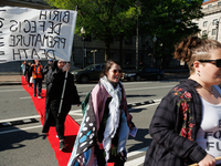 Climate activists with the Extinction Rebellion DC organization stage a protest outside of the John A. Wilson building in Washington, D.C. o...