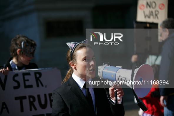 Climate activists with the Extinction Rebellion DC organization stage a protest outside of the John A. Wilson building in Washington, D.C. o...