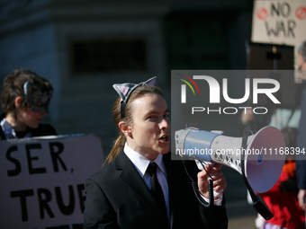 Climate activists with the Extinction Rebellion DC organization stage a protest outside of the John A. Wilson building in Washington, D.C. o...