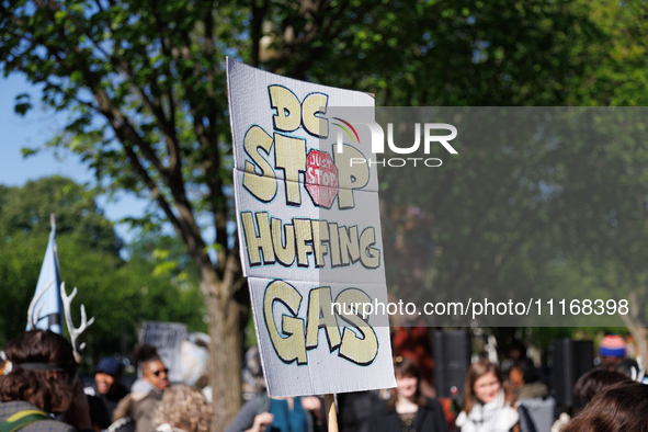 Climate activists with the Extinction Rebellion DC organization stage a protest outside of the John A. Wilson building in Washington, D.C. o...