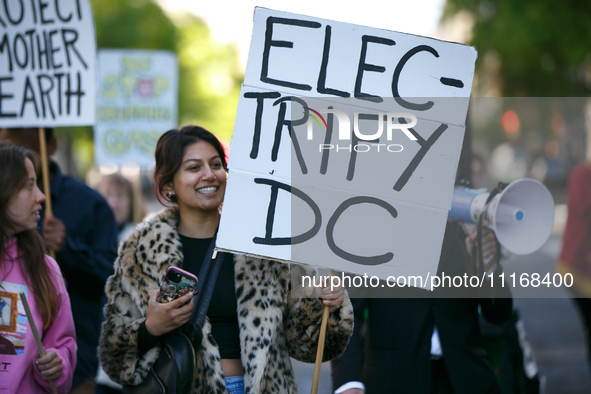 Climate activists with the Extinction Rebellion DC organization stage a protest outside of the John A. Wilson building in Washington, D.C. o...