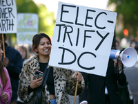 Climate activists with the Extinction Rebellion DC organization stage a protest outside of the John A. Wilson building in Washington, D.C. o...