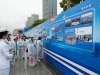 Children are learning naval knowledge during the Open Ship Day in Shanghai, China, on April 23, 2024. (