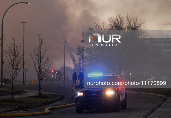 EDMONTON, CANADA - APRIL 22:
Emergency services at the scene as firefighters relentlessly combat flames that tore through Edmonton's histori...