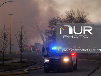 EDMONTON, CANADA - APRIL 22:
Emergency services at the scene as firefighters relentlessly combat flames that tore through Edmonton's histori...