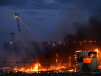 EDMONTON, CANADA - APRIL 22:
Several units of firefighters combat flames that tore through Edmonton's historic Hangar 11 on Monday evening,...