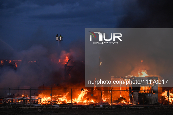 EDMONTON, CANADA - APRIL 22:
Firefighters combat flames that tore through Edmonton's historic Hangar 11 on Monday evening, on April 22, 2024...