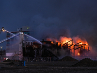 EDMONTON, CANADA - APRIL 22:
Several units of firefighters combat flames that tore through Edmonton's historic Hangar 11 on Monday evening,...