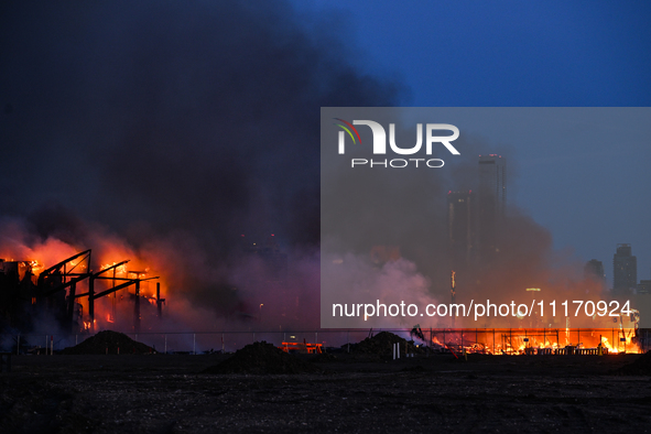 EDMONTON, CANADA - APRIL 22:
Several units of firefighters combat flames that tore through Edmonton's historic Hangar 11 on Monday evening,...