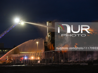 EDMONTON, CANADA - APRIL 22:
Several units of firefighters combat flames that tore through Edmonton's historic Hangar 11 on Monday evening,...