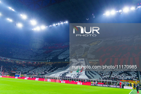 The atmosphere is electric at the San Siro Stadium during the match between AC Milan and FC Internazionale for Serie A at Giuseppe Meazza St...