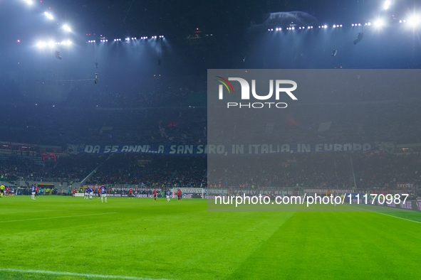 The atmosphere is electric at the San Siro Stadium during the match between AC Milan and FC Internazionale for Serie A at Giuseppe Meazza St...