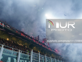 Supporters of AC Milan are cheering during the match between AC Milan and FC Internazionale in Serie A at Giuseppe Meazza Stadium in Milan,...