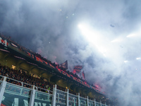 Supporters of AC Milan are cheering during the match between AC Milan and FC Internazionale in Serie A at Giuseppe Meazza Stadium in Milan,...