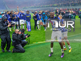 Marcus Thuram is celebrating during the AC Milan versus FC Internazionale match in the Serie A at Giuseppe Meazza Stadium in Milan, Italy, o...