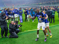 Marcus Thuram is celebrating during the AC Milan versus FC Internazionale match in the Serie A at Giuseppe Meazza Stadium in Milan, Italy, o...