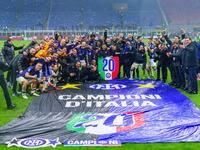 The FC Inter team is celebrating their championship during the match against AC Milan in the Serie A at Giuseppe Meazza Stadium in Milan, It...