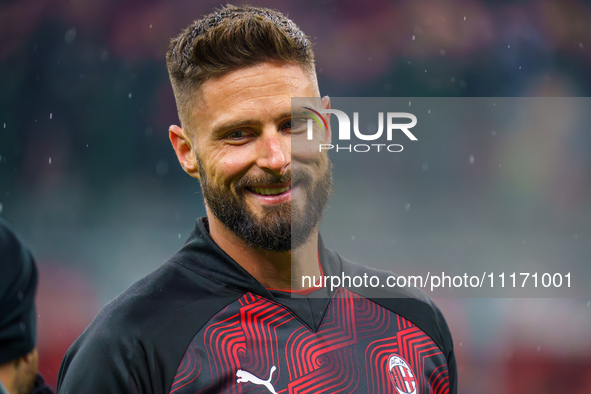 Olivier Giroud is playing for AC Milan against FC Internazionale in a Serie A match at Giuseppe Meazza Stadium in Milan, Italy, on April 22,...