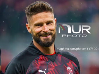 Olivier Giroud is playing for AC Milan against FC Internazionale in a Serie A match at Giuseppe Meazza Stadium in Milan, Italy, on April 22,...