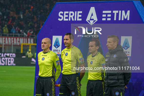 Referee Andrea Colombo is officiating the match between AC Milan and FC Internazionale in the Serie A at Giuseppe Meazza Stadium on April 22...