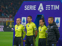 Referee Andrea Colombo is officiating the match between AC Milan and FC Internazionale in the Serie A at Giuseppe Meazza Stadium on April 22...