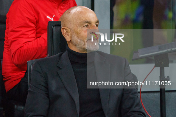 Stefano Pioli, the head coach of AC Milan, is watching the game between AC Milan and FC Internazionale in the Serie A at Giuseppe Meazza Sta...