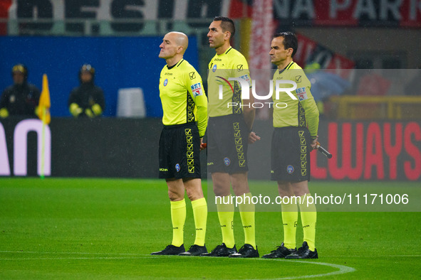 Referee Andrea Colombo is officiating the match between AC Milan and FC Internazionale in the Serie A at Giuseppe Meazza Stadium on April 22...