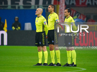 Referee Andrea Colombo is officiating the match between AC Milan and FC Internazionale in the Serie A at Giuseppe Meazza Stadium on April 22...