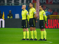 Referee Andrea Colombo is officiating the match between AC Milan and FC Internazionale in the Serie A at Giuseppe Meazza Stadium on April 22...