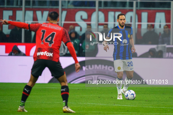 Hakan Calhanoglu is playing during the AC Milan versus FC Internazionale match in Serie A at Giuseppe Meazza Stadium on April 22, 2024. 