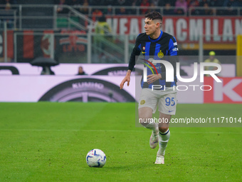 Alessandro Bastoni is playing during the AC Milan versus FC Internazionale Serie A match at Giuseppe Meazza Stadium in Milan, Italy, on Apri...