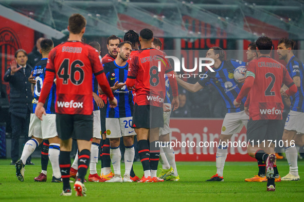 Hakan Calhanoglu and Ruben Loftus-Cheek are playing during the AC Milan versus FC Internazionale Serie A match at Giuseppe Meazza Stadium in...